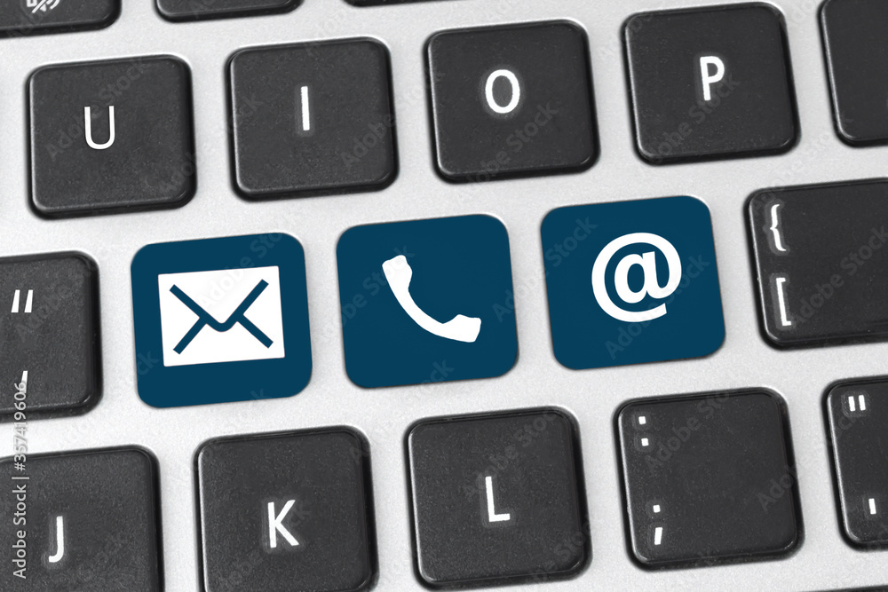 Contact us' button on keyboard. Concept of internet online contact through website. Contact us' button on keyboard. Concept of internet online contact through website.