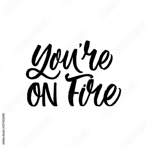 Hand drawn lettering card. The inscription: You are on fire. Perfect design for greeting cards, posters, T-shirts, banners, print invitations.
