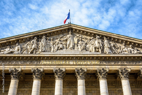 Fotografija Low angle view of the pediment of the Palais Bourbon, seat of the french National Assembly in Paris, France, bearing the inscription Assemblée Nationale in golden letters