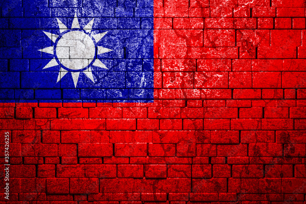 National flag of Taiwan on brick  wall background.The concept of national pride and symbol of the country. Flag  banner on  stone texture background.