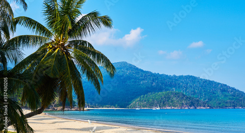 Beautiful view on the beach in a tropical resort. Landscape of paradise tropical island beach. Perfect getaway. View of beauty of island.