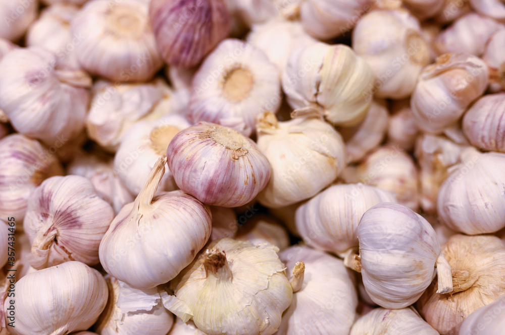 a pile of vegetables white garlic as background a pile of vegetables white garlic as background