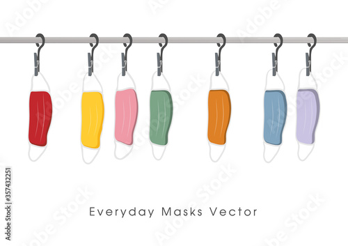  A clean, colorful masks vector hung on a clothesline