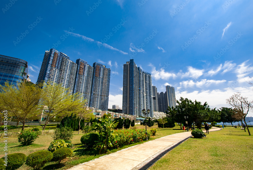 Obraz premium Waterfront park and Middle-class residential area in Cyberport, Hong Kong