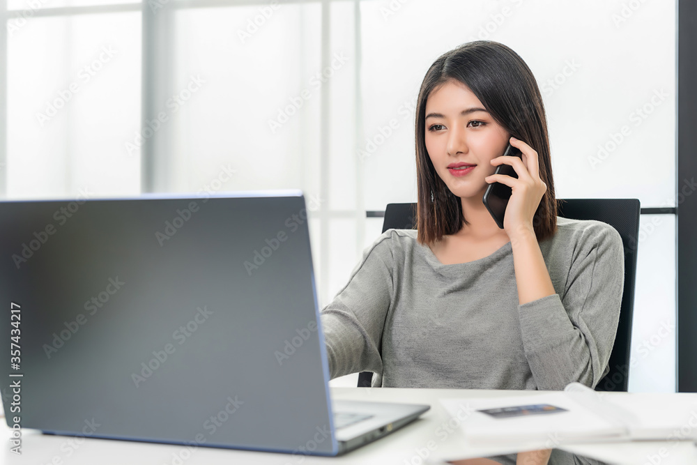 Working Woman talking on the mobile phone Working Woman talking on the mobile phone