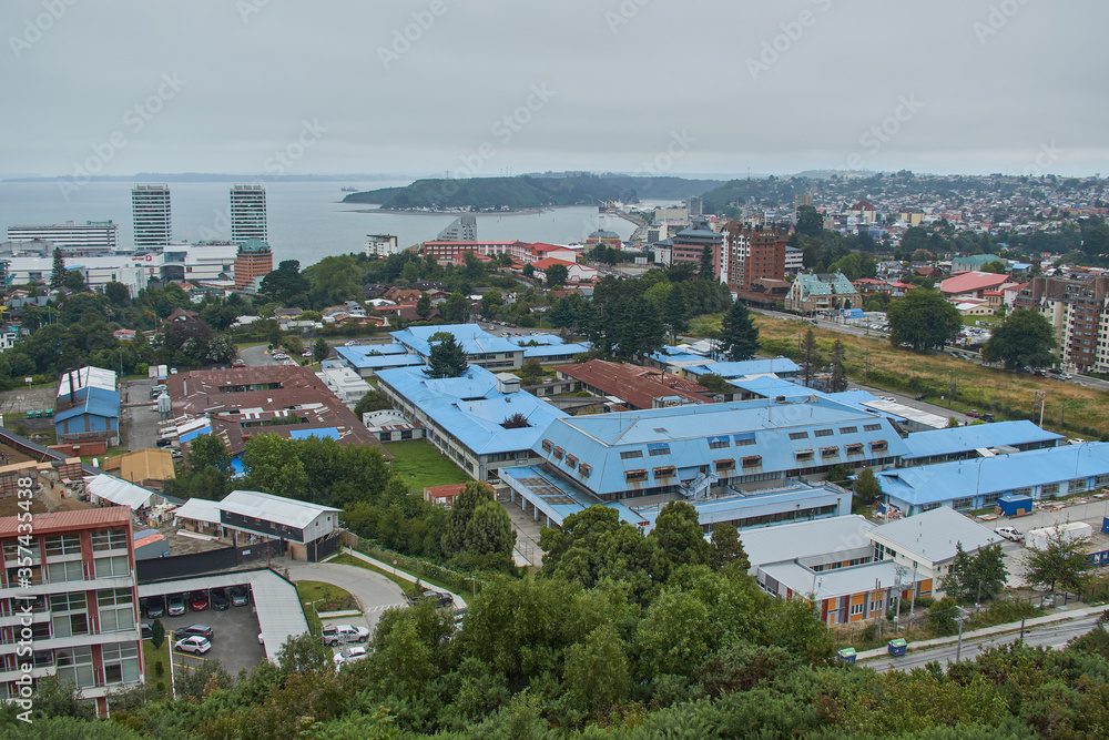 PUERTO MONTT, CHILE - FEBRUARY 10, 2020: Panoramic view of Puerto Montt, Lake District, Chile. Big cruise in the bay.