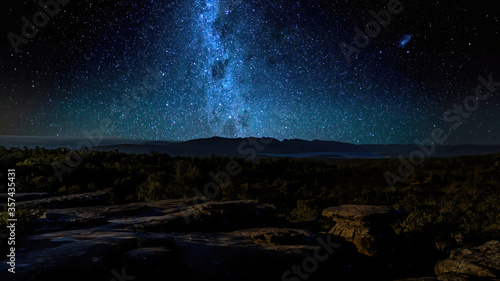 The Milky Way in the mountains of the Grampians National Park in  Victoria, Australia at a clear starry night in summer. © ms_pics_and_more