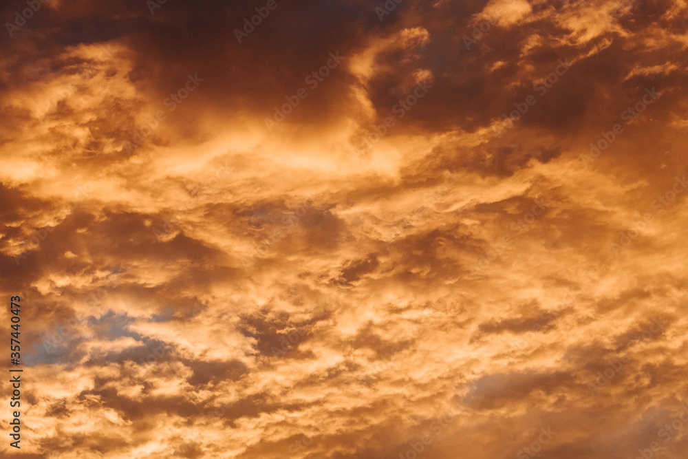 Orange clouds in the sky during sunset