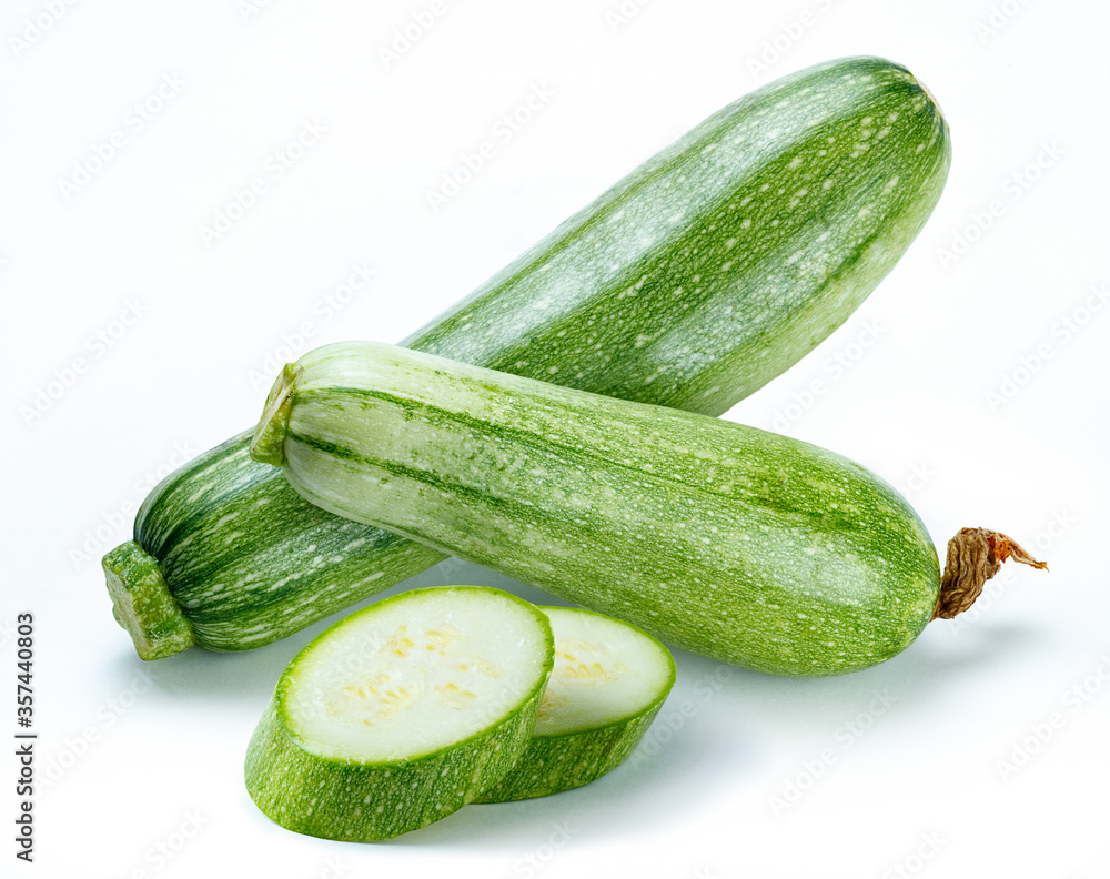 zucchinies with slices retouched and isolated white backgound zucchinies with slices retouched and isolated white backgound
