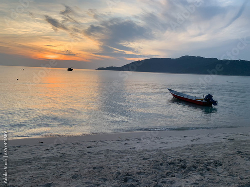 Boat near the beach at dawn