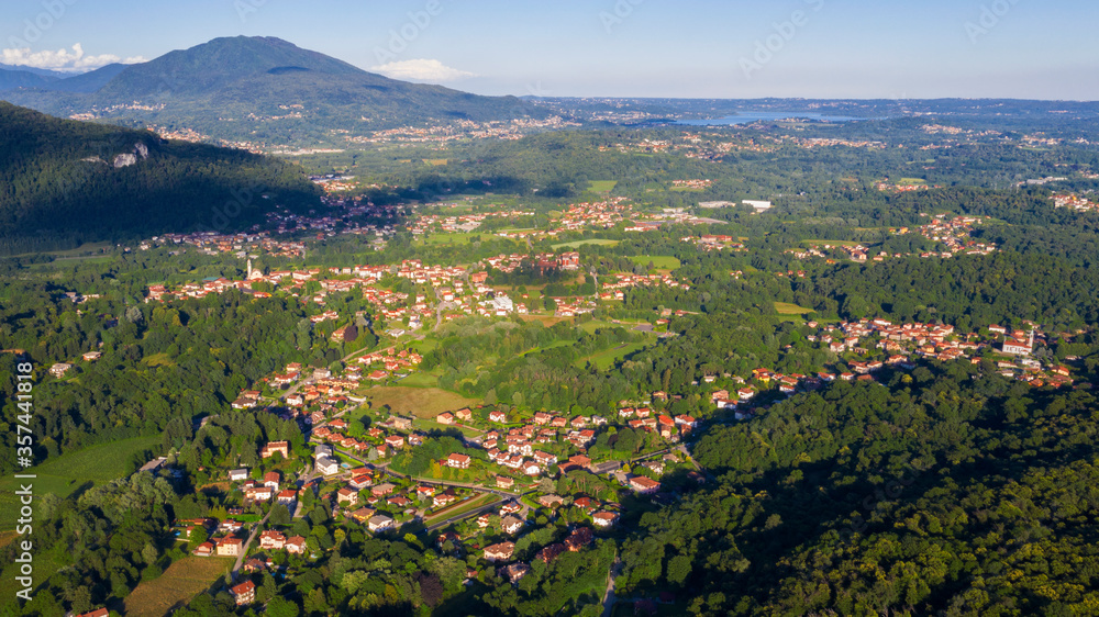 Aerial view of Leggiuno and Varese Lake, in Italy,  during the summer season