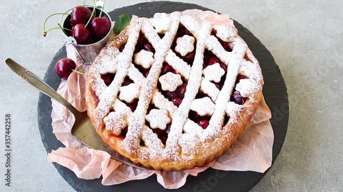 Tasty homemade cherry pie sweet rotates 360 degrees photo