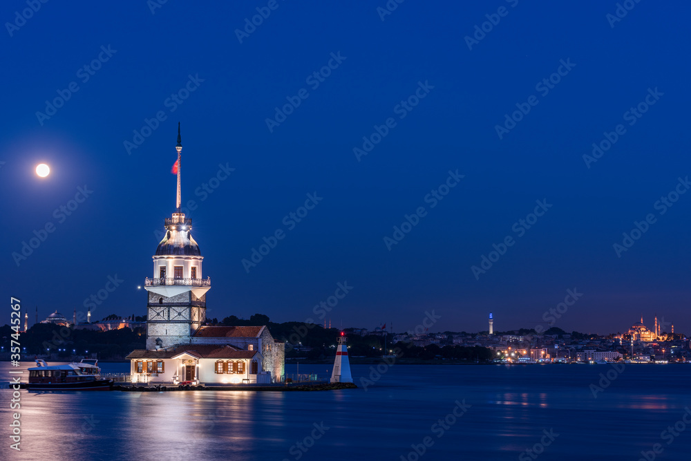 Fototapeta premium Maiden's Tower with moonset fullmoon view. Istanbul, Turkey (KIZ KULESI - USKUDAR)