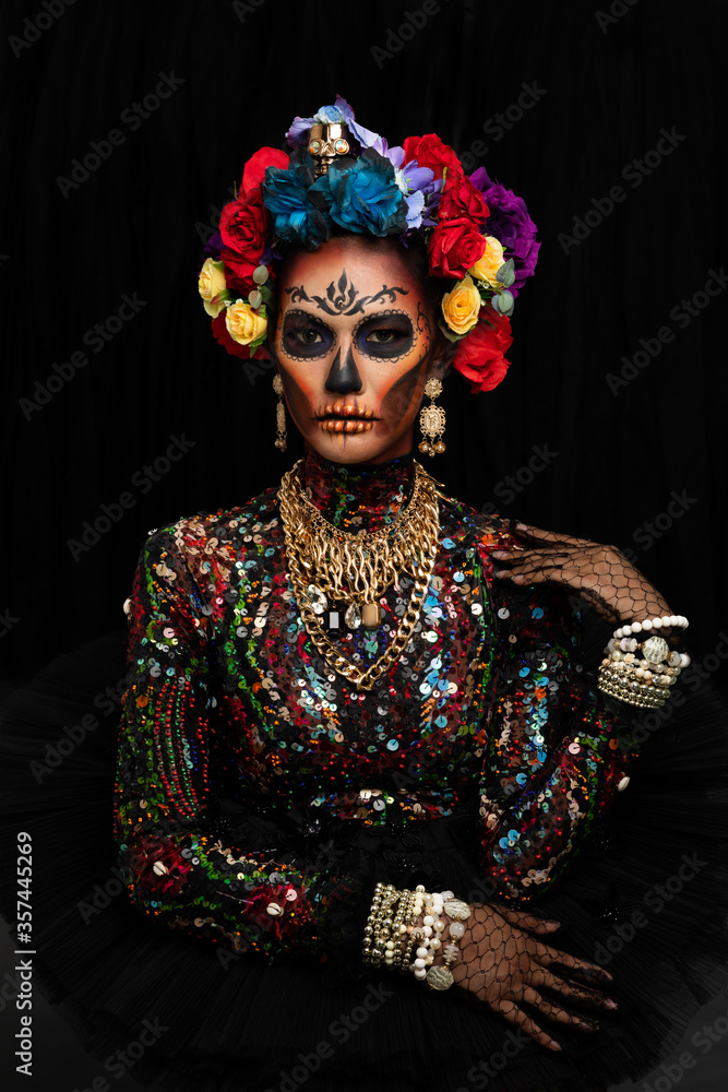 Closeup portrait of female model with a sugar skull makeup