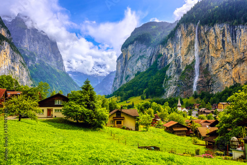 Photography Lauterbrunnen village in an Alps mountains valley, Switzerland