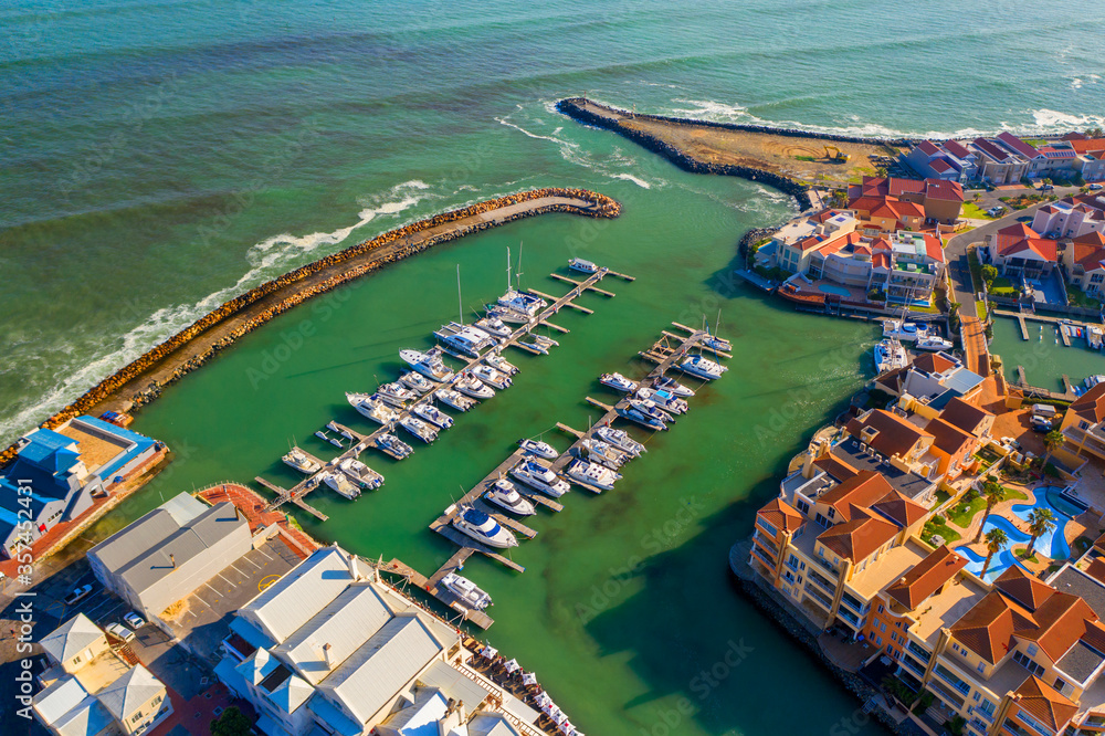 Aerial view of a protected marina with boats near Strand, South Africa