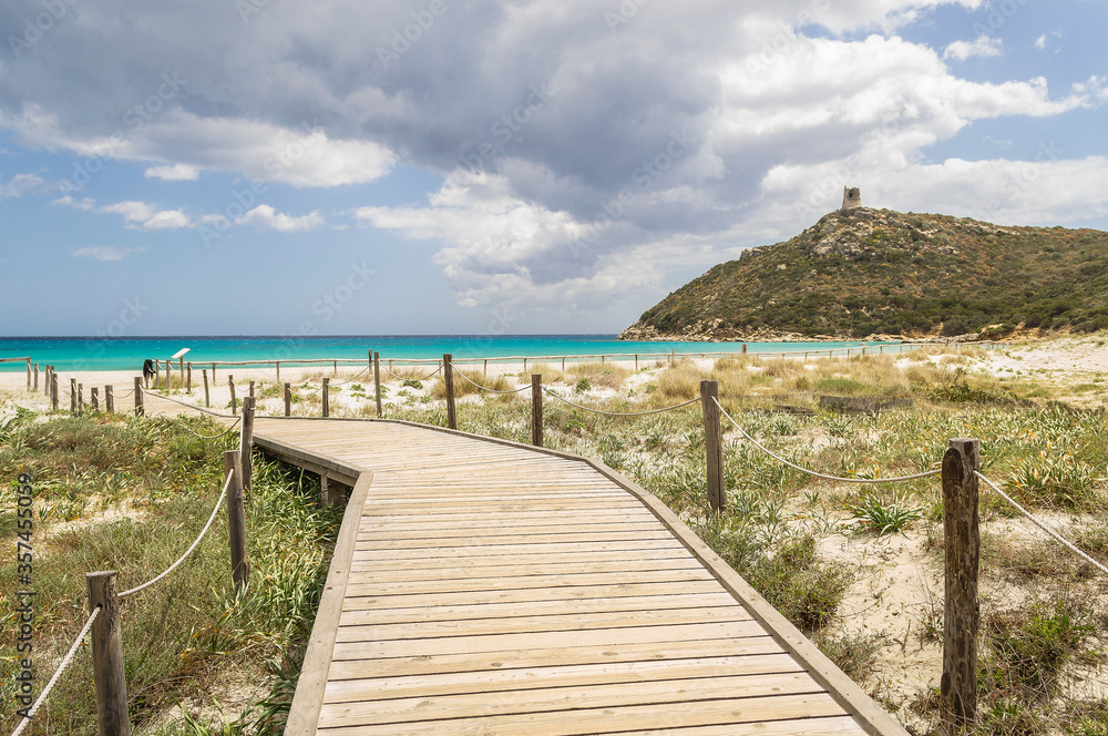 Walking to a beach in the southeast of Sardinia (Italy).
