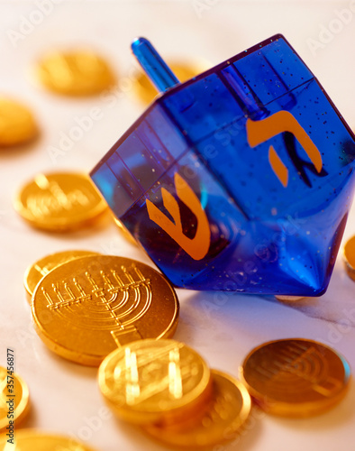 фотографія Jewish Hanukah dreidel and chocolate gelt