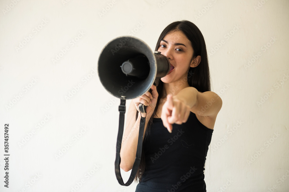 woman shout and blame via megaphone woman shout and blame via megaphone