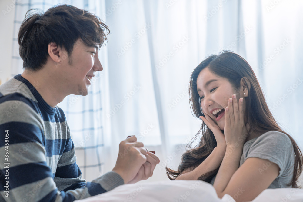 Happy asian couples, The husband gave his wife a wedding anniversary gift. Happy asian couples, The husband gave his wife a wedding anniversary gift.