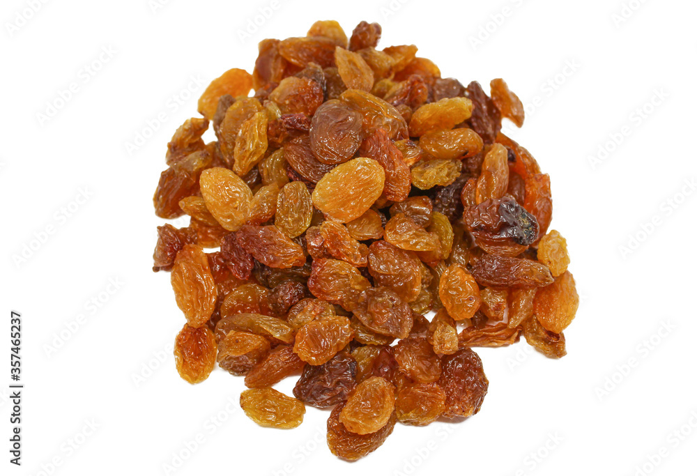 Pile of dried grapes isolated on white background. Brown Raisins close-up Pile of dried grapes isolated on white background. Brown Raisins close-up