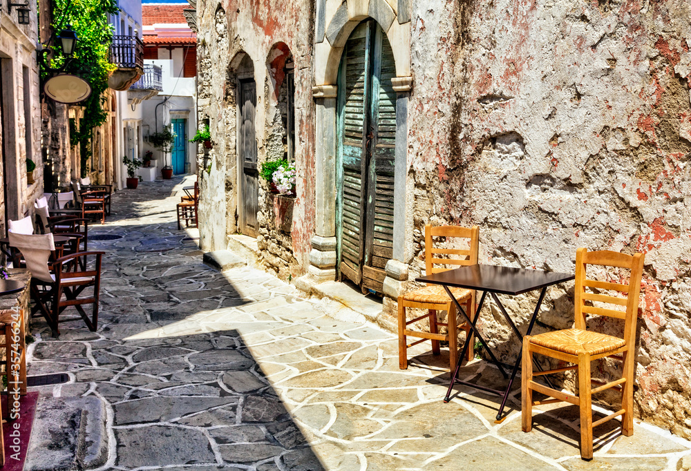 Traditional Greece. Typical street cafe bars. Halki village.  Naxos island, Cycades.