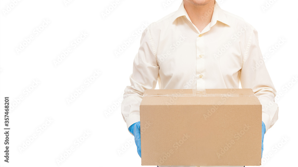 deliveryman hands in sterile gloves of courier for safe delivery parcel in un label eco cardboard box during quarantine of pandemic social distance isolated on white background mockup with copy space.