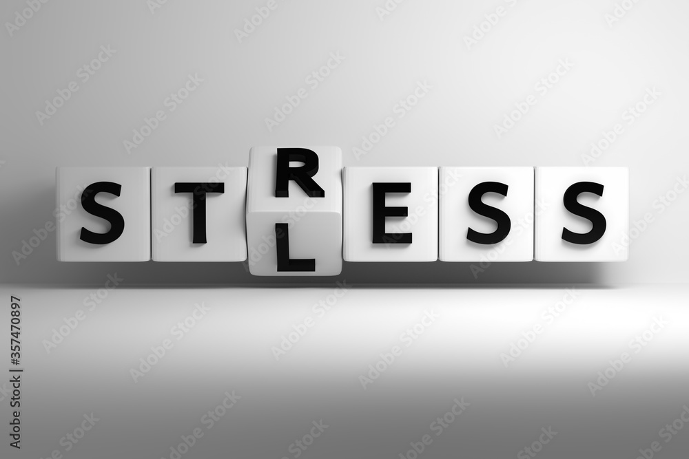 Words Stress Less written in bold large letters on white cubes Words Stress Less written in bold large letters on white cubes