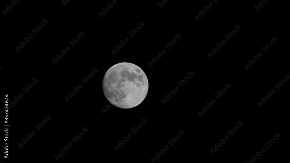The moon in the sky at night. High quality FullHD footage The moon in the sky at night. High quality FullHD footage