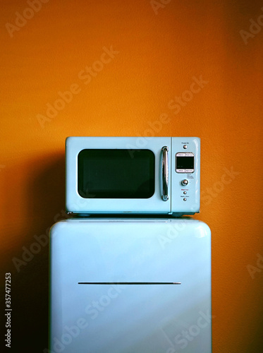 Fotografie Retro fridge and microwave