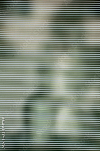 Abstract of pedestrians through blinds