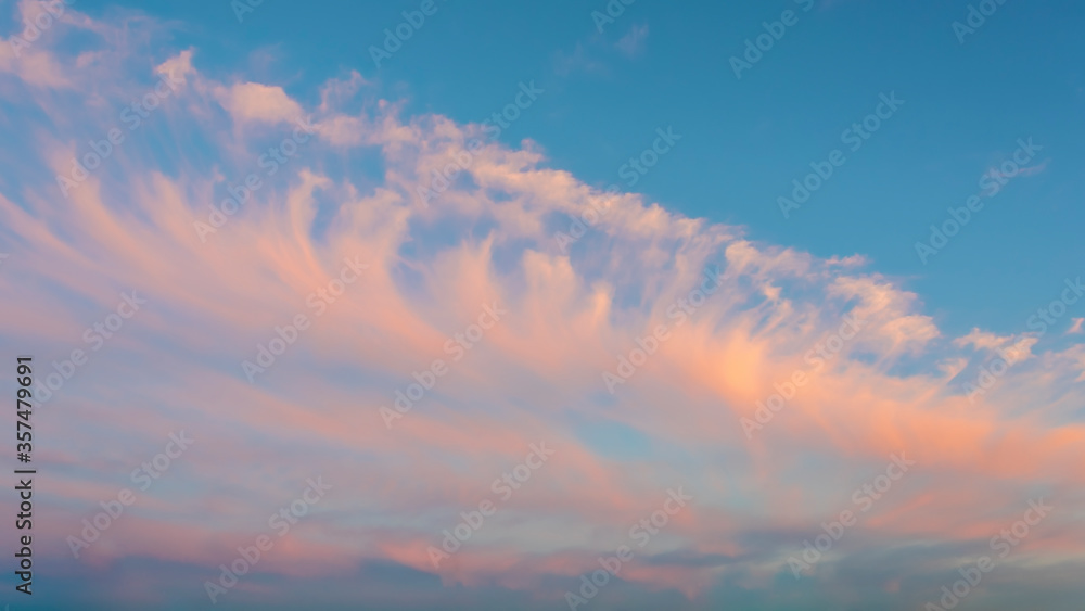 Sunset sky with soft clouds as background