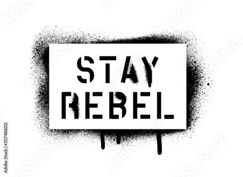 STAY REBEL quote. Spray paint graffiti stencil with copious leakage. A message for any personal or collective rebellion or dissatisfaction.