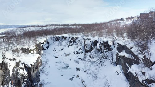 Flying over a beautiful rocky canyon in Abisko National Park. King's Trail.