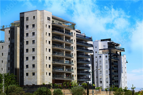 New residential buildings in Israel. Apartments with sunny balconies in a new area in Israel. Modern israeli residential buildings. Real estate in Israel