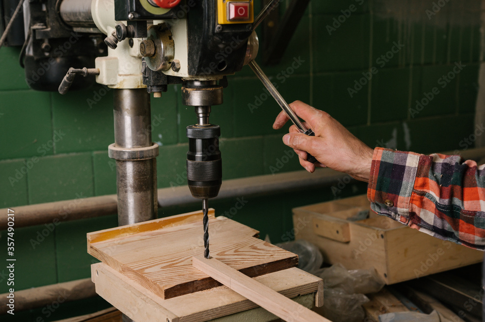 Working process in the carpentry workshop Working process in the carpentry workshop