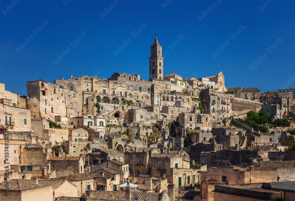 Panorama of famous Italian city Matera. Matera city in the region of Basilicata, in Southern Italy, is a complex of cave dwellings carved into the ancient river canyon.