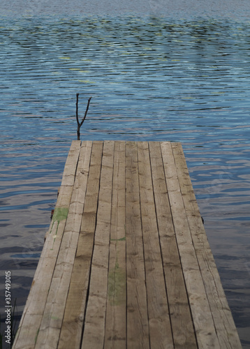 Beautiful lake with diving board for swimming.
