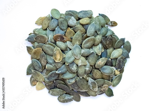 Pumpkin seeds isolated on a white background. Photography pumpkin seeds.