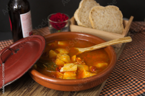 Presentation of a plate of traditional food from Spain, potatoes from La Rioja photo