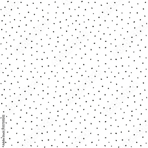 Classic Polka Dots pattern. Hand drawn ink texture with small dots. Elegant and simple Dotted background. Black and white seamless doodle vector illustration.