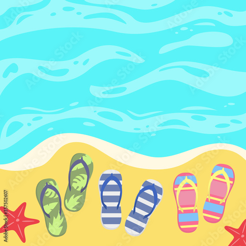 Summer background with slates on the sand by the sea.