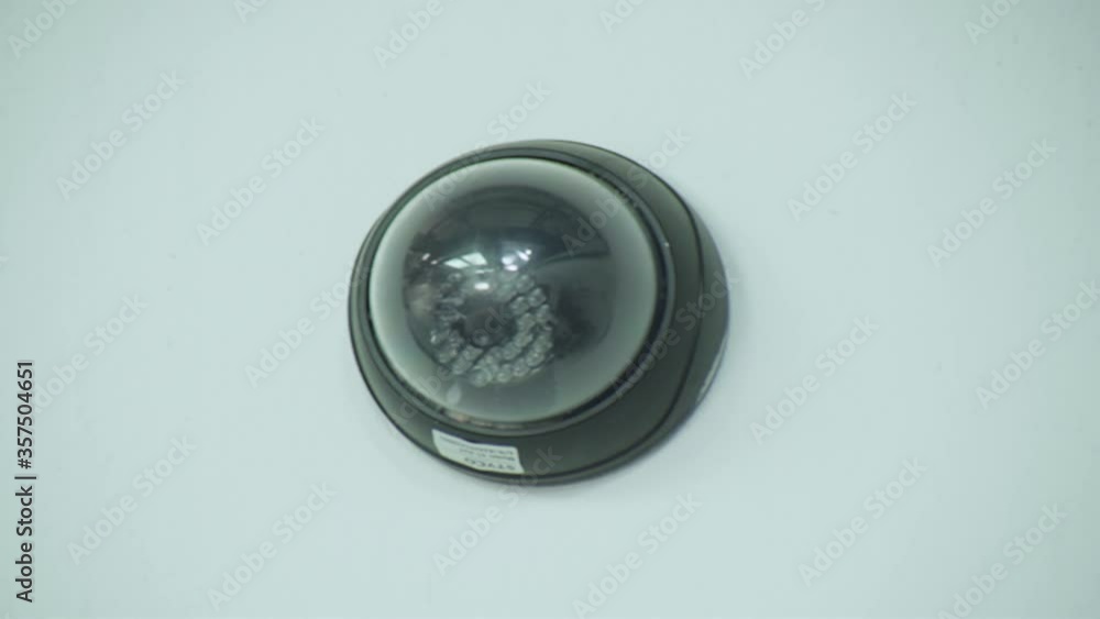 Security video camera, scan the area for surveillance purposes. Robotic CCTV recording technology. Security video camera, scan the area for surveillance purposes. Robotic CCTV recording technology.