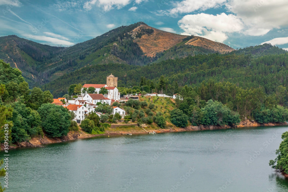 Scenic view of templar village and castle by the river - Dornes, Portugal
