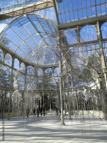 The Crystal Palace (Palacio de Cristal) is located in the Retiro park in Madrid, Spain. It is a metal structure used for expositions of contemporaneous art. 