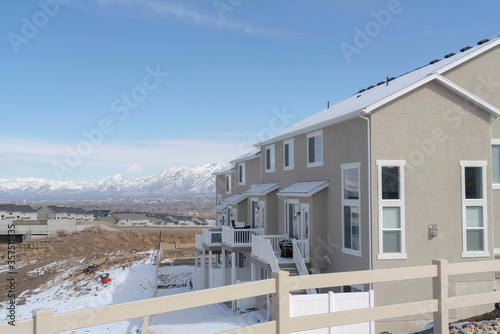 Neighborhood homes in South Jordan City overlooking valley and Wasatch Mountains
