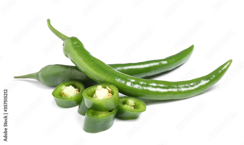 Cut and whole green hot chili peppers on white background Cut and whole green hot chili peppers on white background