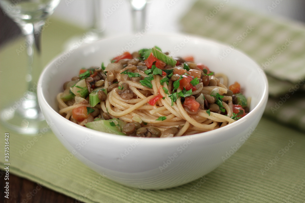 whole-grain spaghetti in a sauce of lentils, tomatoes, celery and herbs