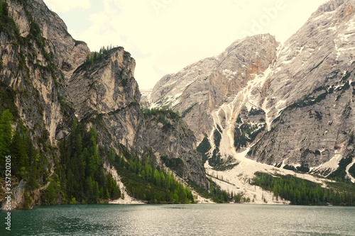 Horizontal shot of the Prags lake in The Fanes-Senns-Prags Nature Park located in South Tyrol, Italy photo