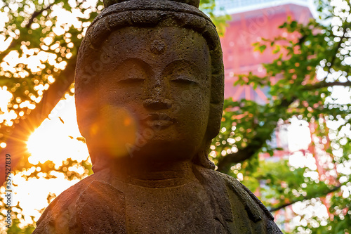 Japanese Buddhist statue in a temple in Tokyo, Japan photo